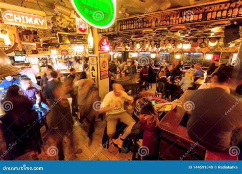 Funny Evening Inside Beer Bar With Crowd Of Friendly People Old Retro