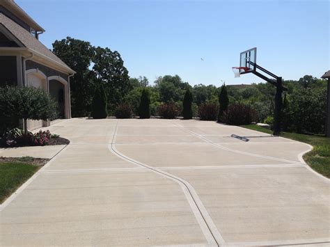 Low And High Plants At End Of Driveway At Home Gym Basketball Court