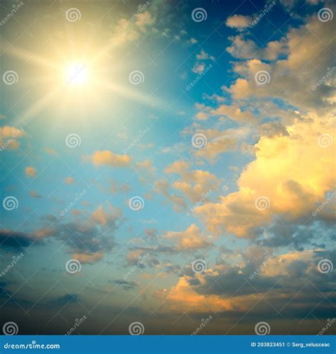 Epic Sky Landscape With Bright Sun And Golden Clouds Stock Image