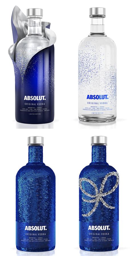 Four Bottles Of Absolut Water With Blue And Silver Glitters On The Lids