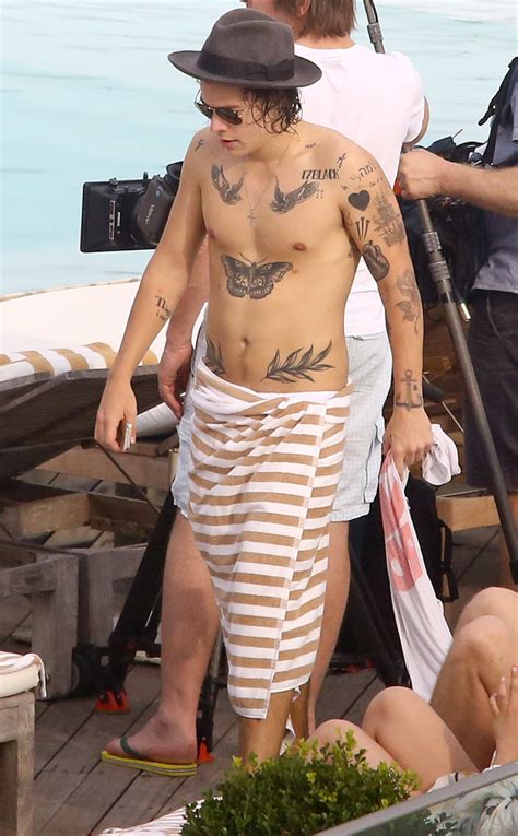 Harry Styles Goes Shirtless Shows Off His Sexy Tattooed Body While