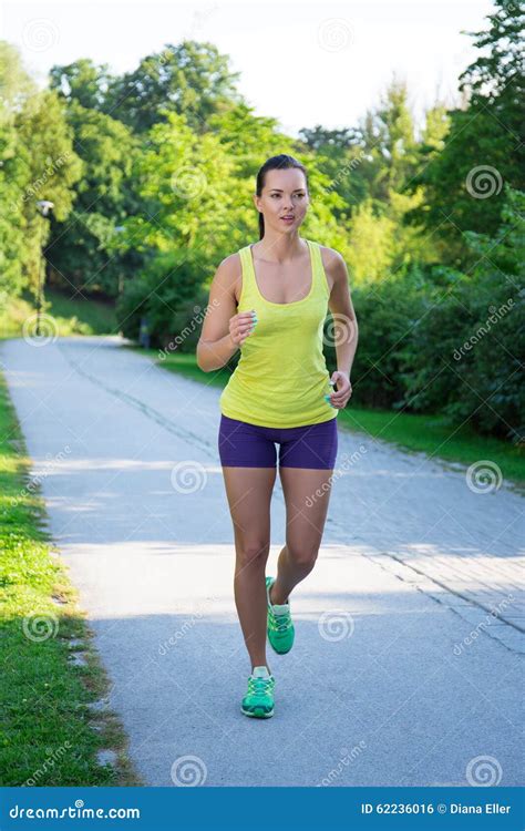 Slim Jogging Woman Running In Morning Park Stock Photo Image Of