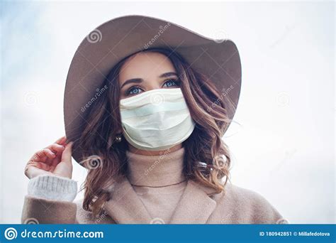 Beautiful Woman In Medical Face Mask Enjoying Walk Outdoor Portrait
