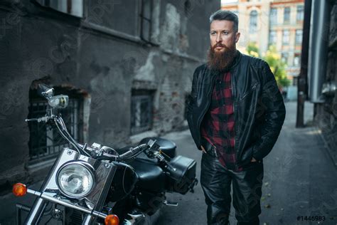 Bearded Biker In Leather Clothes Against Chopper Stock Photo Crushpixel