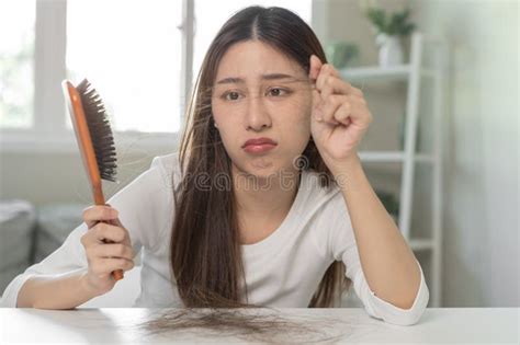 Serious Worried Asian Young Woman Girl Holding Brush Show Her Comb