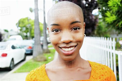 Portrait Of Bald Smiling Black Woman Stock Photo Dissolve