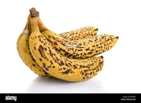 Cluster Of Over Ripe Bananas Isolated On White Background Stock Photo