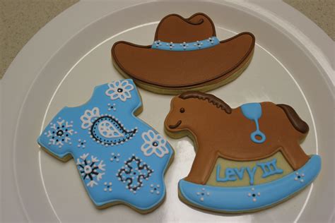 Cowboy themed baby shower cookies. 11-16-12 | Cowboy cookies, Cowboy baby shower, Baby shower ...