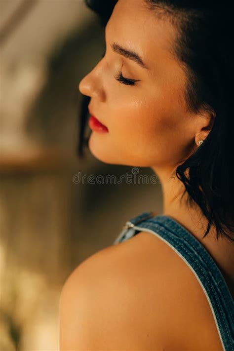 Sensual Profile Of An Attractive Brunette With Bare Shoulders Stock