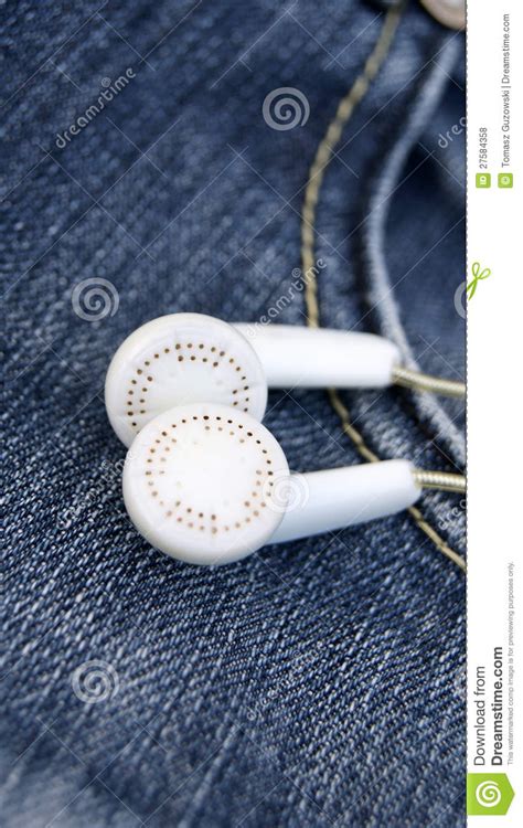 White Earphones In Denim Jeans Pocket Stock Photo Image Of Rear