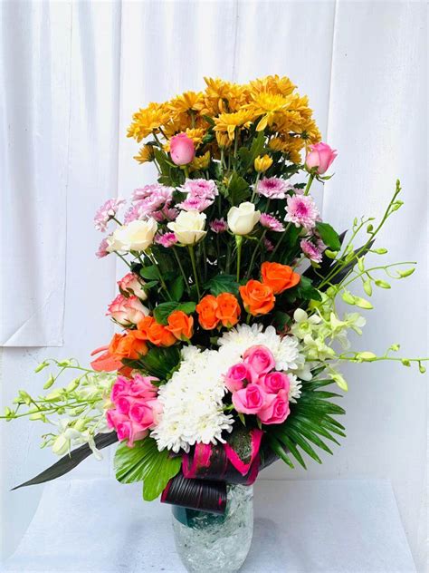 Vase Flower Arrangement Of Roses Chrysanthemums Orchids Blooms Only