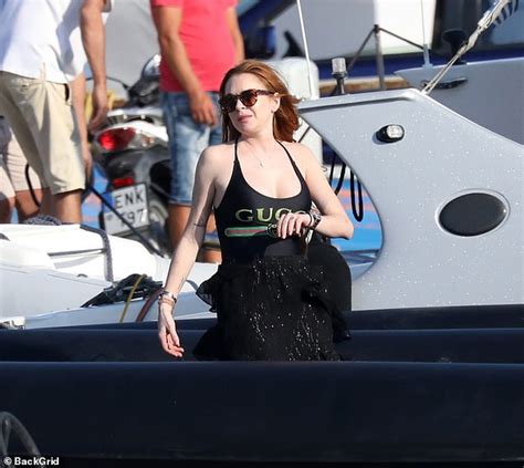 Lindsay Lohan Dons Black Bathing Suit And Frilled Skirt In Mykonos For
