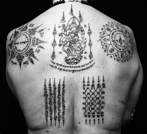 Sak Yant Thai Tattoo Symbols And Meanings Tatouage Yantra Yantra Tattoo Sak Yant Tattoo Yoga