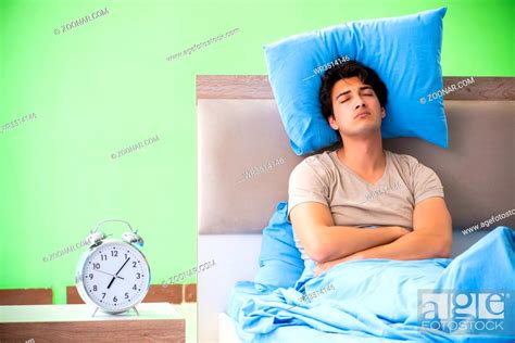 Man Having Trouble With His Sleep Stock Photo Picture And Royalty