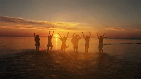 Group Of Happy Friends Running In To Water Stock Footage Sbv 328222811 Storyblocks