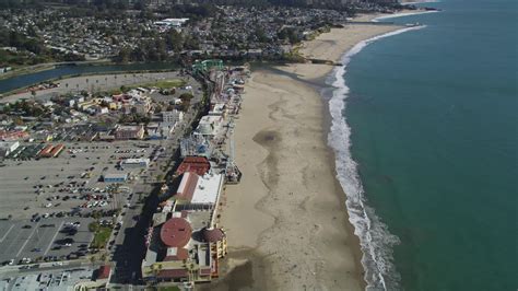 5k Stock Footage Aerial Video Of Orbiting The Beach And Rides At Santa