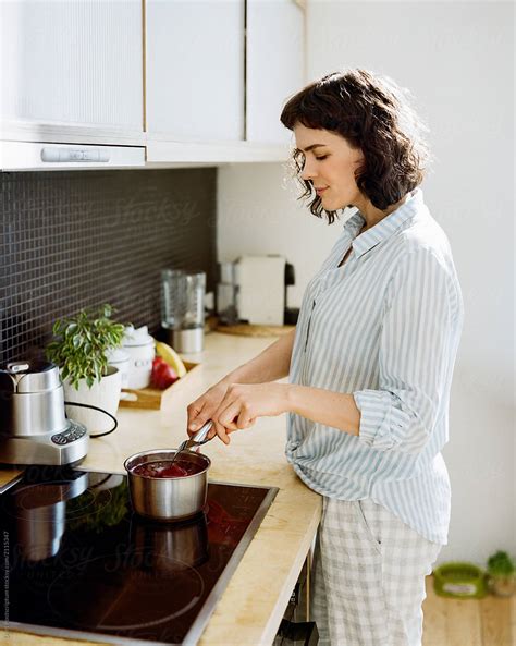Woman Cooking In Kitchen By Stocksy Contributor Duet Postscriptum