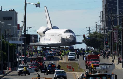 The Space Shuttle Endeavour Is Transported Through The Streets Of Los