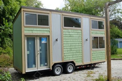 Featured in thow for sale. 240 Sq. Ft. Tiny Cabin on Wheels (For Sale - $30k)