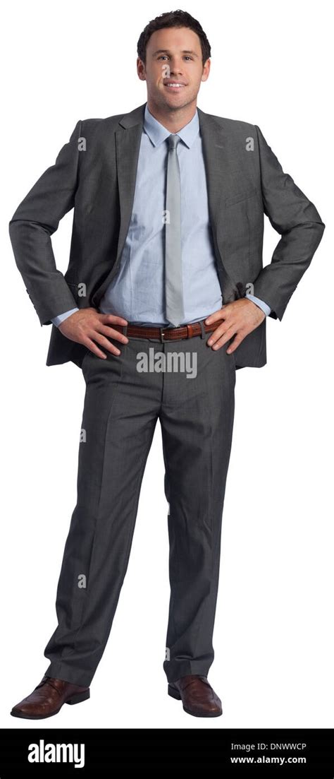 Smiling Businessman With Hands On Hips Stock Photo Royalty Free Image