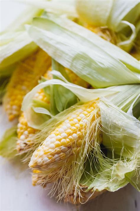 Once you're ready to cook, remove the husks and silks—nobody wants those strings in their way as they. Perfect Boiled Corn On The Cob