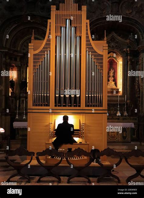 Man Playing Pipe Organ In A Church Stock Photo Alamy