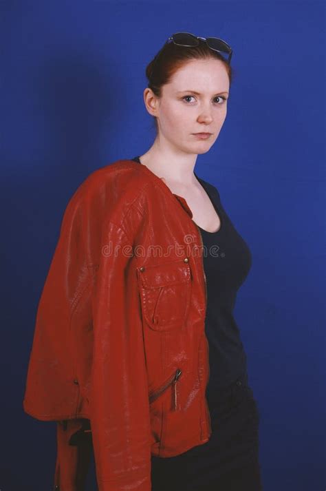 Young Woman Posing In Vintage Fashion Red Leather Jacket Stock Photo