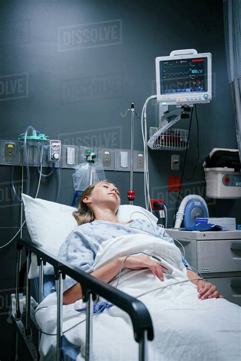 Caucasian Girl Sleeping In Hospital Bed Stock Photo Dissolve