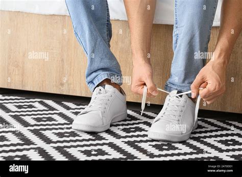 Man Putting On Shoes Hi Res Stock Photography And Images Alamy
