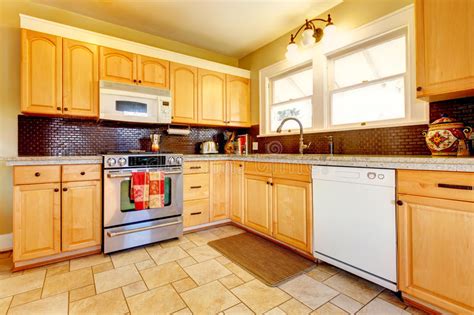 See more ideas about kitchen cabinets, kitchen remodel, cabinets to ceiling. Light Tones Wood Kitchen With Brick Backsplash Design ...