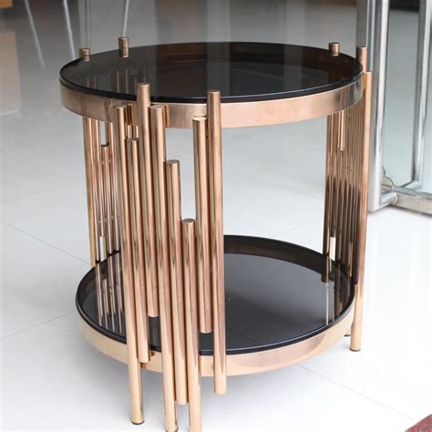 1300 x 650 x 400 high. China New Design Glass Coffee Table with Metal Frame ...