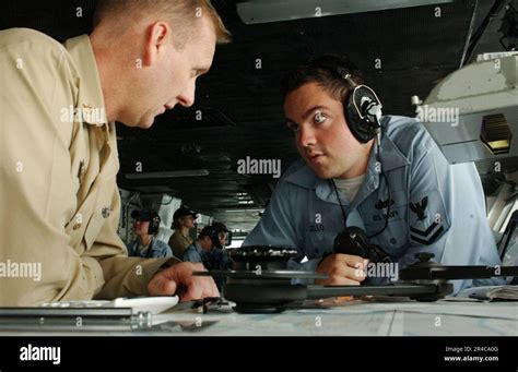 Us Navy Quartermaster 2nd Class Receives Training On Navigation Charts