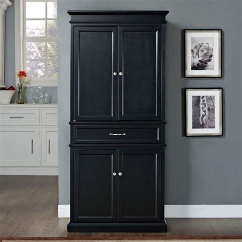 Black cabinets bring drama to the kitchen, but without the drama. Black Kitchen Pantry Cabinet - Home Furniture Design
