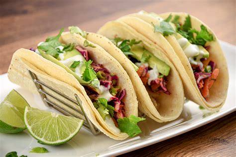 Heat tortillas according to package directions. Fish Tacos with Lime Crema | Sunshine Rising
