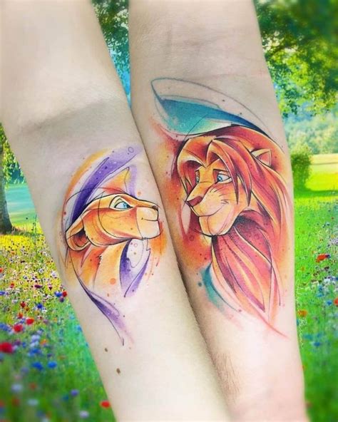 Two Tattoos With Lions On Their Arms