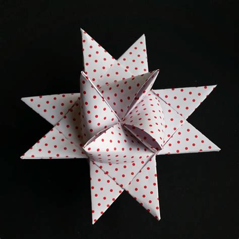 Learn how to fold a quick and simple origami paper star. How to make a Froebel star - a classic Danish Christmas ...