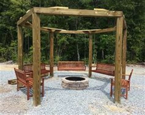 Swinging into a fire of course! Cool Fire Pit Circle! #porchswings #firepitcircle | Porch Swings in 2019 | Fire pit patio, Patio ...