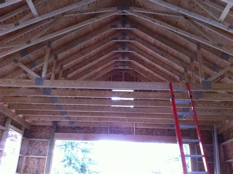 Vaulted ceilings typically put the ceiling right up the the roof which means you can have skylights. Vaulted Ceiling Truss Suggestions? Tall Pitch - The Garage ...