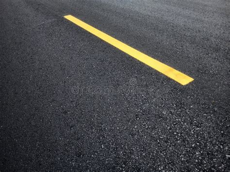 Road Traffic Paint Yellow On The Asphalt Surface Stock Photo Image Of