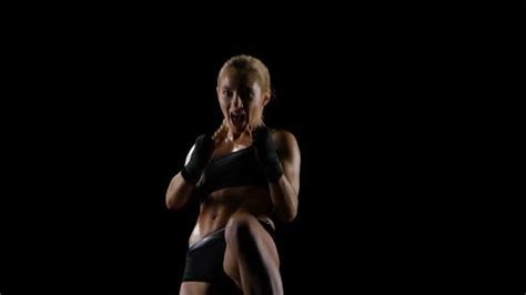 Punches And Kicks By Delightful Athlete Girl Boxer Slow Motion By