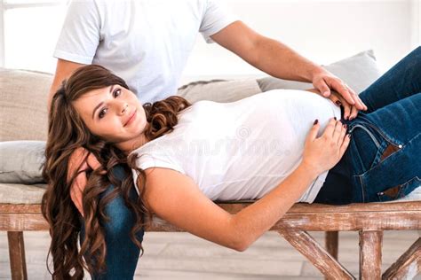 Pregnant Couple Hug And Hold Pregnant Belly Stock Photo Image Of