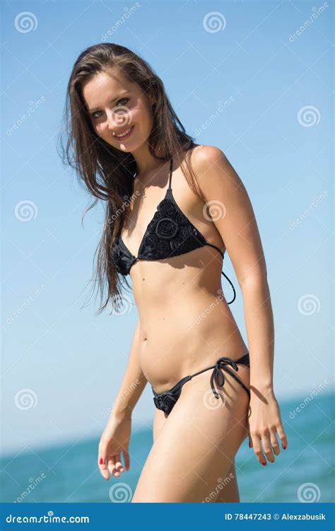 Girl In Black Bikini Looking At Camera Stock Image Image Of Black