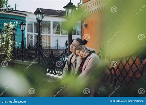 Lgbt Lesbian Couple Love Moments Concept Two Young Lesbians Girls Hugging And Walking Outdoors