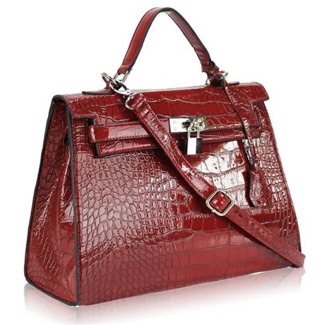 Red Handbags Home › Handbags › Designer Inspired Handbags › Red Patent Faux Burberry