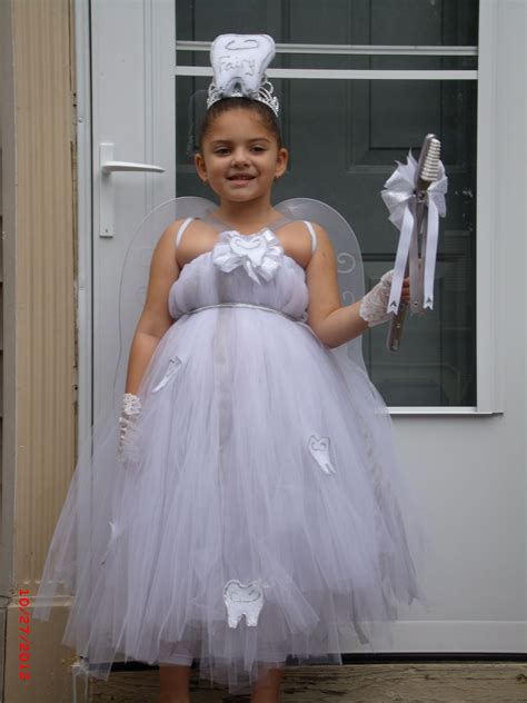 Here's a simple diy tutorial to make your child a tooth fairy costume. Homemade Tooth fairy costume for my daughter Halloween 2012 | Fairy costume, Tooth fairy ...