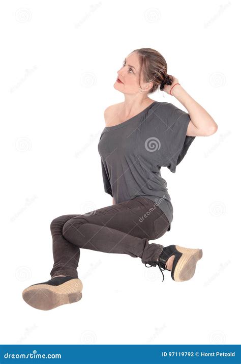 Young Woman Sitting On Floor And Looking Up Stock Photo Image Of