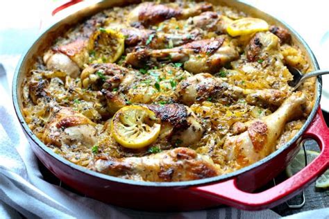 This greek style chicken recipe is special because of the greek marinade, and it's cooked in a single pan, making cleaning afterwards an easy job. One Pot Roasted Greek Chicken and Rice - Girl and the Kitchen