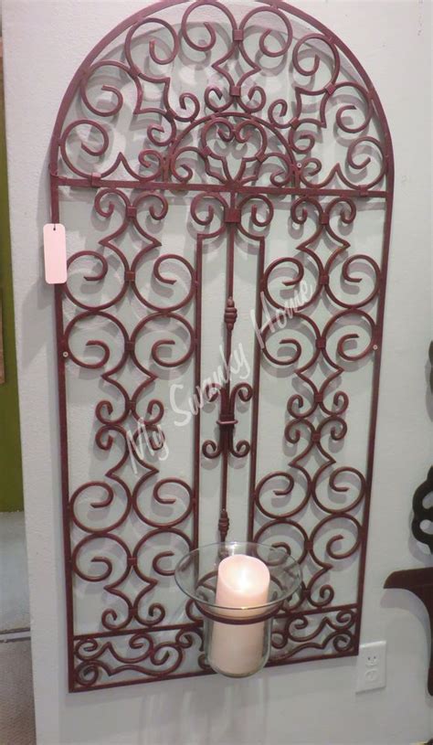 Group a few sconces together on the wall or style pillars and plates in a corner for soft lighting in your reading nook. Extra Large 50" Iron Scroll Wall Panel CANDLE HOLDER ...