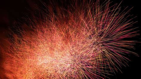 Download Wallpaper 2560x1440 Fireworks Sparks Holiday Widescreen 169