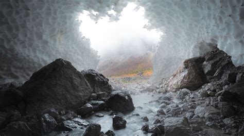 Download Wallpaper 2560x1440 Cave Stones Ice Stream Frozen